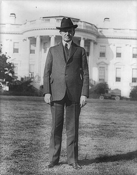Calvin Coolidge in front of the White House