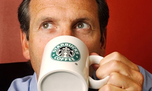 Howard Schultz drinking coffee